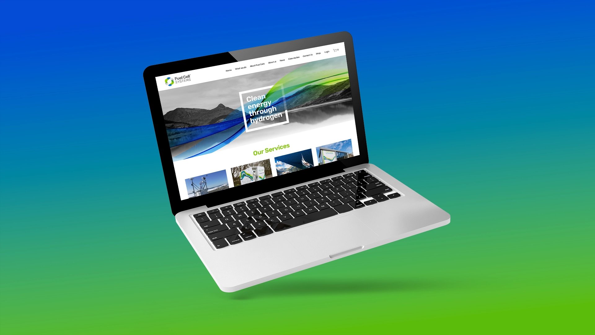 a laptop on a blue and green background